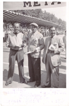 A nuestro buen amigo Mr. Metzler de la XXV Vuelta Ciclista a Cataluna 1946 (Postcard with 3 autographs at the back)